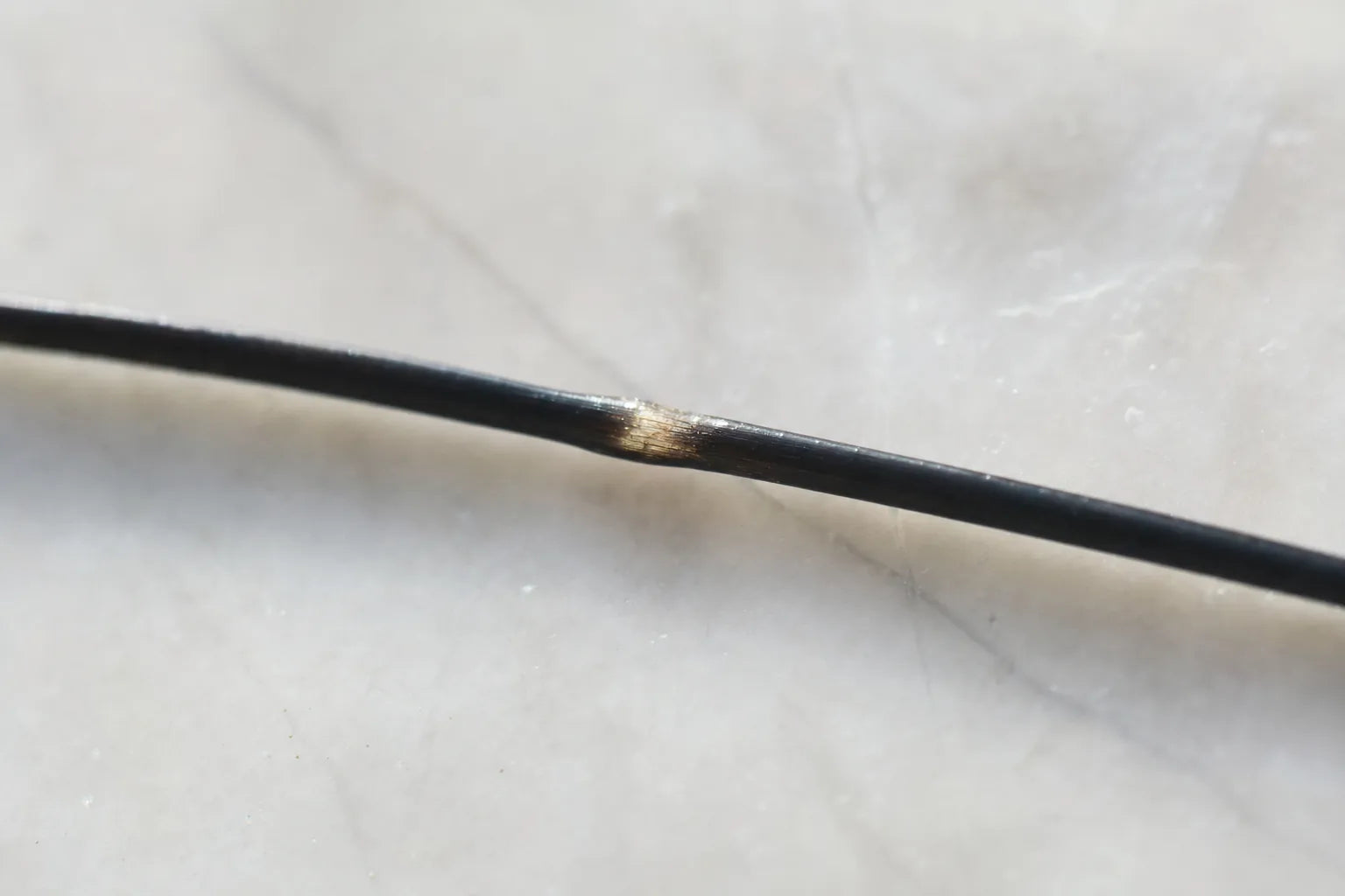A single hair fibre seamlessly mended, hair bond repair.